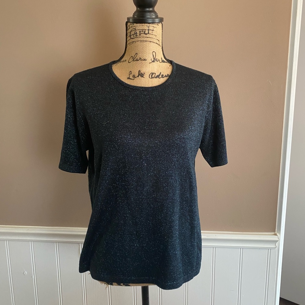 Sparkly short sleeved shirt.